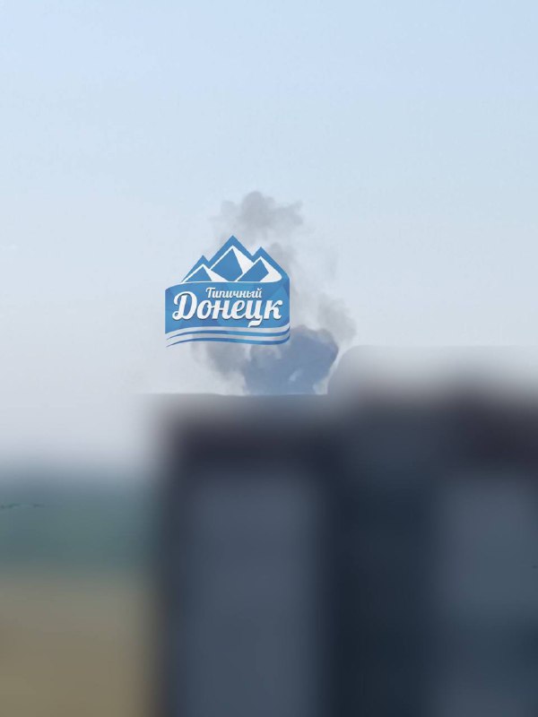 Explosions were reported in Donetsk, smoke rising