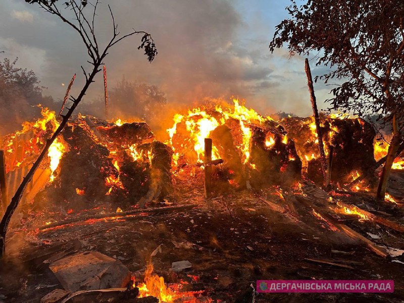 Fires caused by Russian bombardment in Kozacha Lopan of Kharkiv region