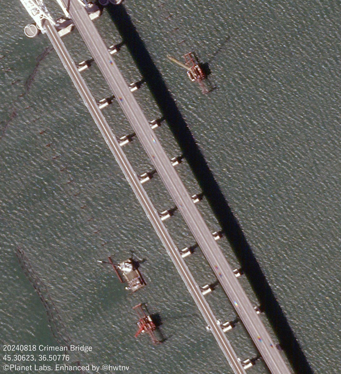 High-resolution satellite images show ships and barricades under construction near the Kerch Bridge in the Crimean Peninsula on August 18