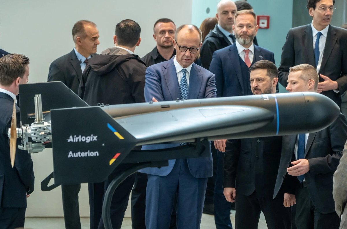German Chancellor Merz and Zelensky checking out Auterion-Airlogix joint venture's Anubis kamikaze drone. Anubis has a Shahed-style layout. The company was created to mass-produce AI-guided autonomous strike drones for Ukraine and NATO. Germany ordered thousands of these drones for Ukraine